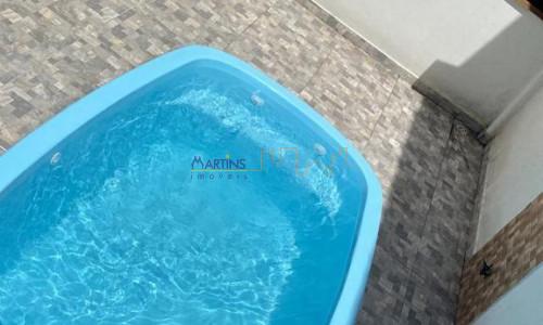 Casa térrea com piscina e vaga autos 125mts²